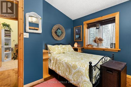 1083 Riding Ranch Rd E, Machar, ON - Indoor Photo Showing Bedroom