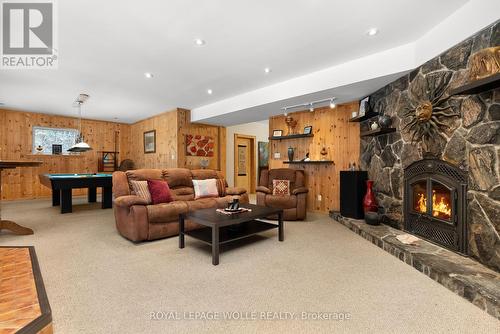 1083 Riding Ranch Rd E, Machar, ON - Indoor With Fireplace