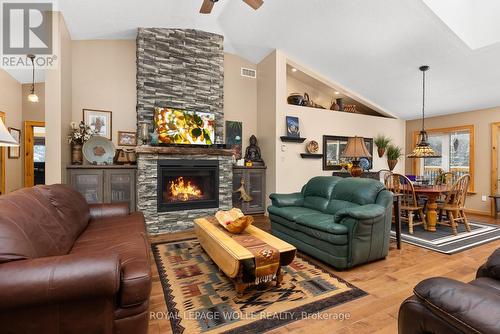 1083 Riding Ranch Rd E, Machar, ON - Indoor Photo Showing Living Room With Fireplace