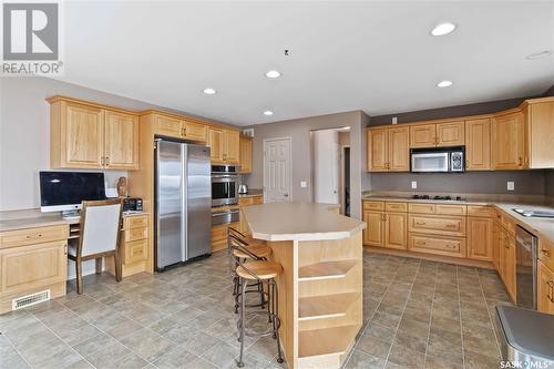 9 Pelican Pass, Blackstrap Thode, SK - Indoor Photo Showing Kitchen With Double Sink
