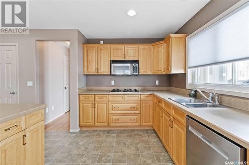 9 Pelican Pass, Blackstrap Thode, SK - Indoor Photo Showing Kitchen With Double Sink