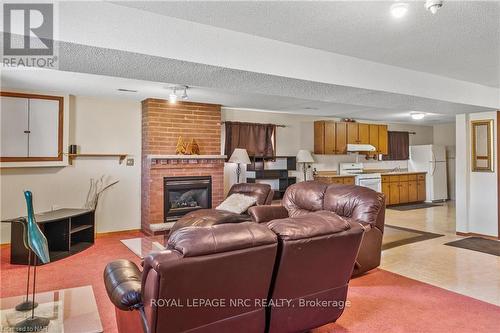3695 Black Creek Rd, Fort Erie, ON - Indoor Photo Showing Living Room With Fireplace