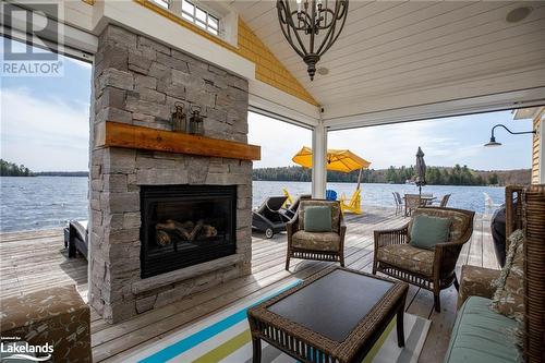 1019 Bluff Road Unit# 5, Port Carling, ON -  With Fireplace With Body Of Water With Exterior