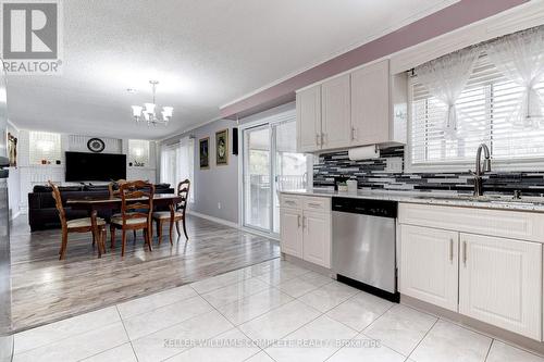 144 Solomon Cres, Hamilton, ON - Indoor Photo Showing Kitchen With Double Sink