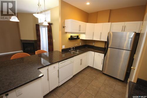 501 1901 Victoria Avenue, Regina, SK - Indoor Photo Showing Kitchen With Stainless Steel Kitchen With Double Sink