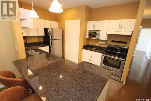 501 1901 Victoria Avenue, Regina, SK - Indoor Photo Showing Kitchen With Double Sink