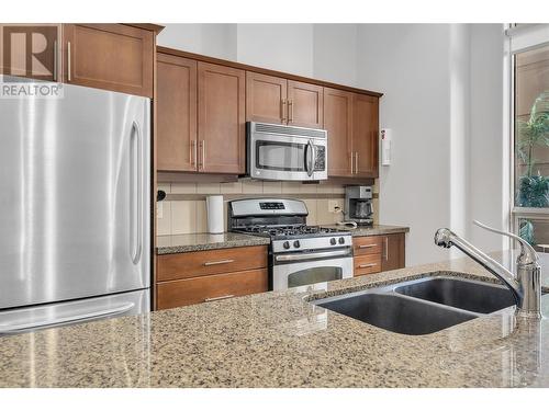 1160 Bernard Avenue Unit# 102, Kelowna, BC - Indoor Photo Showing Kitchen With Double Sink
