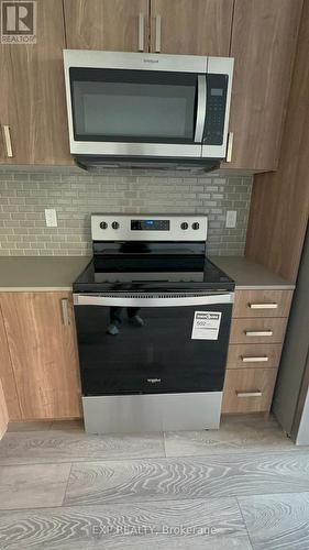 Th21 - 4005 Hickory Drive, Mississauga, ON - Indoor Photo Showing Kitchen