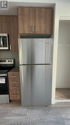 Th21 - 4005 Hickory Drive, Mississauga, ON - Indoor Photo Showing Kitchen