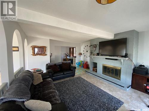 700 6Th Street W, Assiniboia, SK - Indoor Photo Showing Living Room With Fireplace