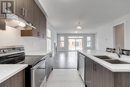 28 Mckay Ave, Kawartha Lakes, ON - Indoor Photo Showing Kitchen With Stainless Steel Kitchen With Double Sink