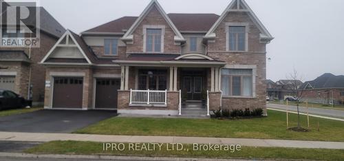 167 Trail Boulevard, Springwater, ON - Outdoor With Facade