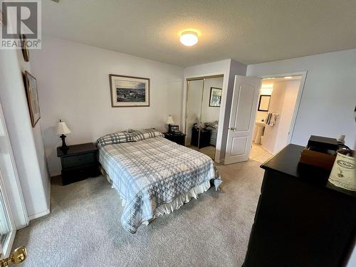 3474 Dunsmuir Road, Lac La Hache, BC - Indoor Photo Showing Bedroom