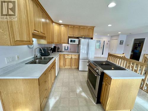 3474 Dunsmuir Road, Lac La Hache, BC - Indoor Photo Showing Kitchen With Double Sink