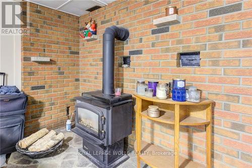 460 Domville St, Wellington North, ON - Indoor Photo Showing Other Room With Fireplace