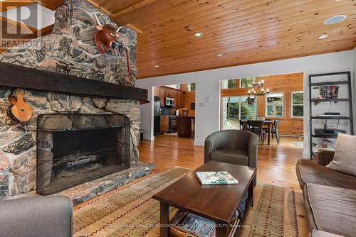 1174 Ashforth Drive, Muskoka Lakes, ON - Indoor Photo Showing Living Room With Fireplace