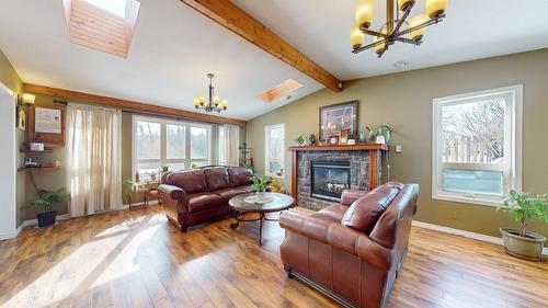 1900 Caldwell Road, Cranbrook, BC - Indoor Photo Showing Living Room With Fireplace