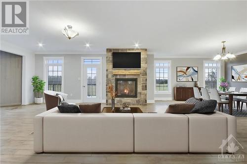 Virtually Staged - 7241 Franktown Road, Richmond, ON - Indoor Photo Showing Living Room With Fireplace