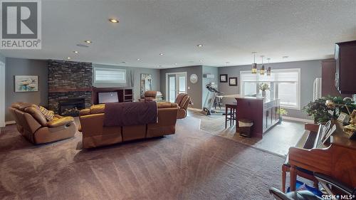 6009 Koep Avenue, Regina, SK - Indoor Photo Showing Living Room With Fireplace