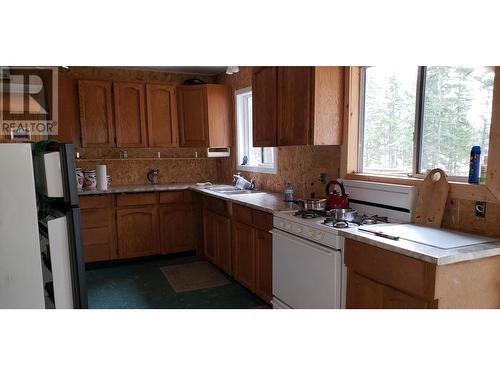 5268 Machete Lake Road, Bridge Lake, BC - Indoor Photo Showing Kitchen With Double Sink
