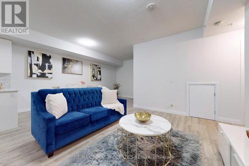 #103 -22 East Haven Dr, Toronto, ON - Indoor Photo Showing Living Room