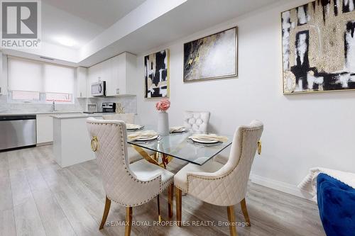 #103 -22 East Haven Dr, Toronto, ON - Indoor Photo Showing Dining Room