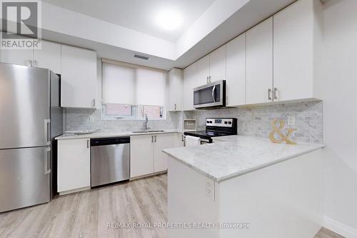 #103 -22 East Haven Dr, Toronto, ON - Indoor Photo Showing Kitchen