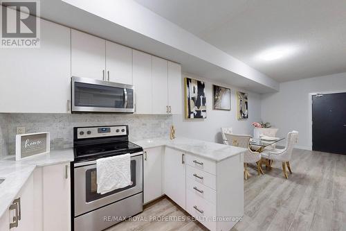 #103 -22 East Haven Dr, Toronto, ON - Indoor Photo Showing Kitchen