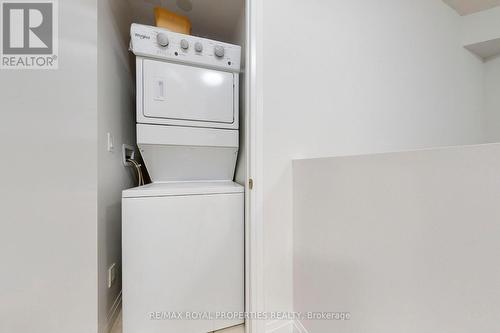 #103 -22 East Haven Dr, Toronto, ON - Indoor Photo Showing Laundry Room