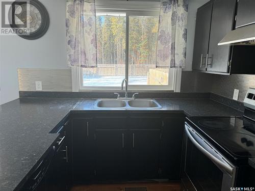 1712 Lawton Crescent, La Ronge, SK - Indoor Photo Showing Kitchen With Double Sink