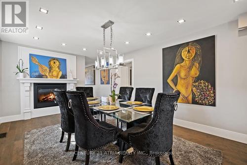 103 Allingham Gdns, Toronto, ON - Indoor Photo Showing Dining Room With Fireplace
