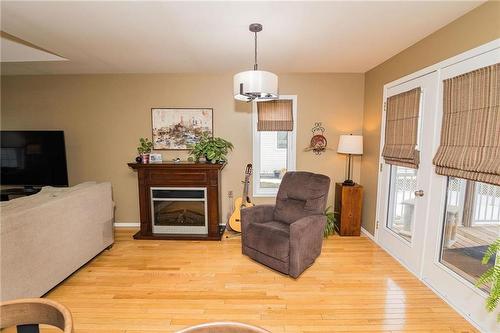 46 6Th Avenue Se, Carman, MB - Indoor Photo Showing Living Room With Fireplace