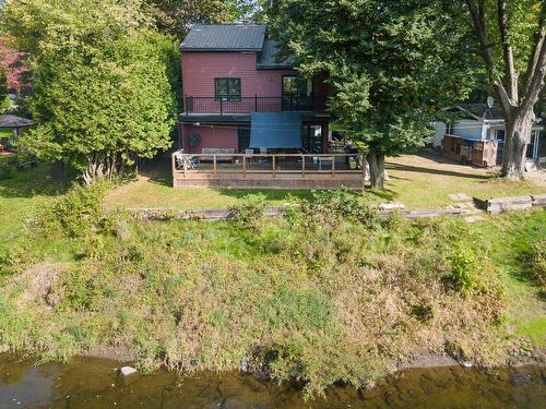 Face arriÃ¨re - 219 Ch. Aurèle, Brigham, QC - Outdoor With Body Of Water With Deck Patio Veranda