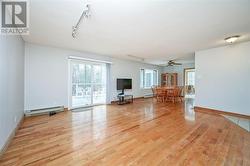 Living Room with gleaming hardwood floors - 