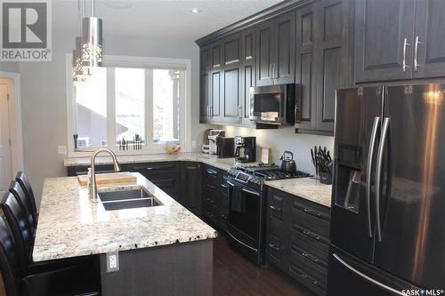 2723 Mcara Street, Regina, SK - Indoor Photo Showing Kitchen With Double Sink With Upgraded Kitchen