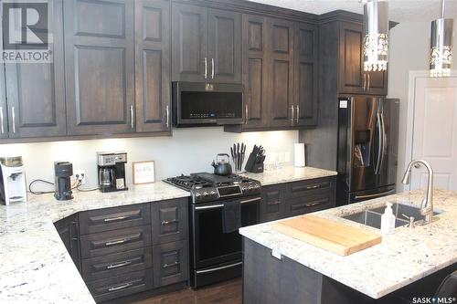 2723 Mcara Street, Regina, SK - Indoor Photo Showing Kitchen With Double Sink With Upgraded Kitchen