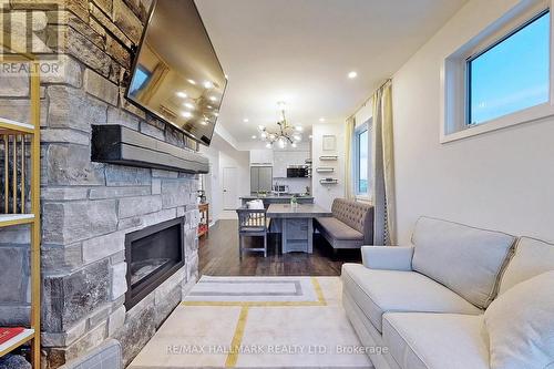 #202 -22 Beckwith Lane, Blue Mountains, ON - Indoor Photo Showing Living Room With Fireplace