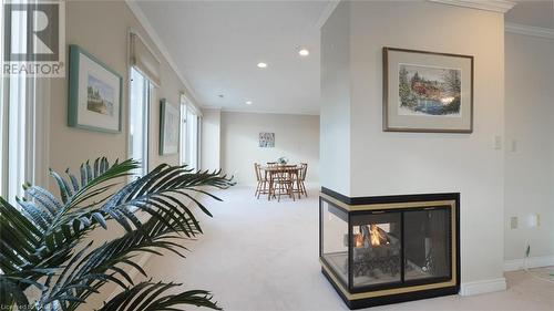 LIVING ROOM VIEW TO BREAKFAST AREA - 2555 3Rd Avenue W Unit# 501, Owen Sound, ON - Indoor With Fireplace