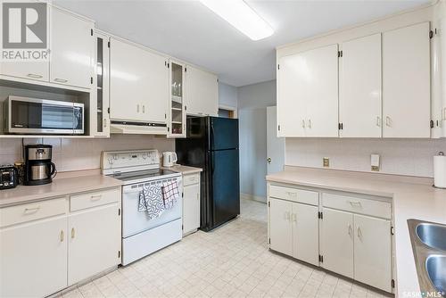 1309 9Th Street E, Saskatoon, SK - Indoor Photo Showing Kitchen With Double Sink