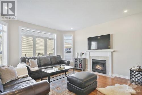 302 Saddleridge Drive, Ottawa, ON - Indoor Photo Showing Living Room With Fireplace