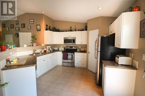 1315 104 Avenue, Dawson Creek, BC - Indoor Photo Showing Kitchen With Double Sink