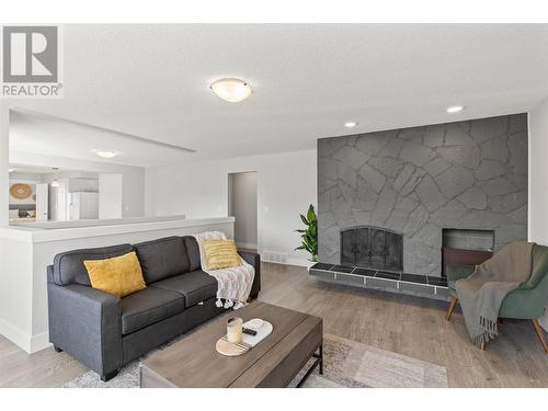 120 Homer Road, Kelowna, BC - Indoor Photo Showing Living Room With Fireplace
