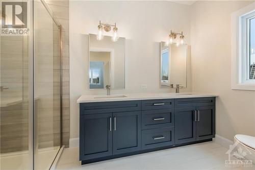 Some photos are virtually staged/digitally altered and NOT the home for sale - similar model by same builder - 178 Danika Street, Hammond, ON - Indoor Photo Showing Bathroom