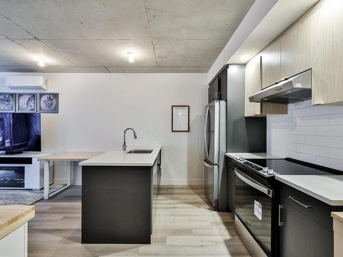 Cuisine - 305-1431 Av. De La Gare, Mascouche, QC - Indoor Photo Showing Kitchen With Upgraded Kitchen