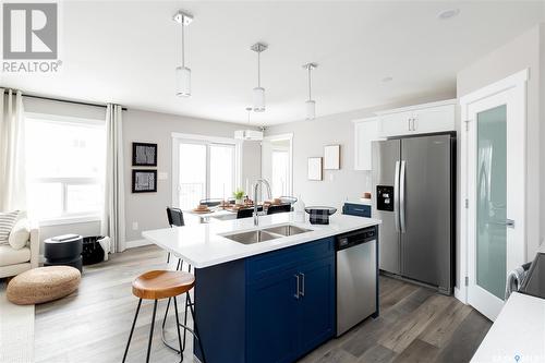 282 Schmeiser Bend, Saskatoon, SK - Indoor Photo Showing Kitchen With Stainless Steel Kitchen With Double Sink With Upgraded Kitchen