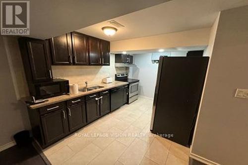 34 Mactier Dr, Vaughan, ON - Indoor Photo Showing Kitchen With Double Sink