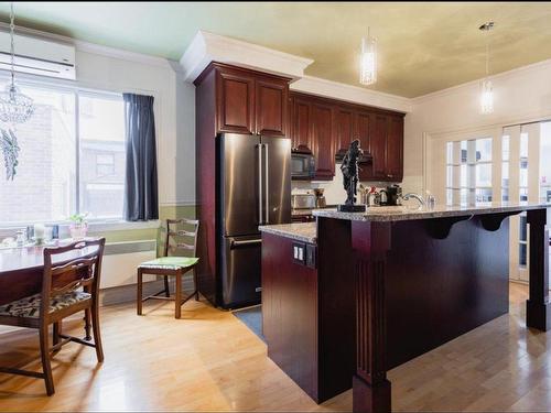 Dining room - 2-6375 Boul. Pie-Ix, Montréal (Rosemont/La Petite-Patrie), QC - Indoor Photo Showing Kitchen With Upgraded Kitchen