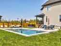 Piscine - 3124 Rue Édouard-Harbec, Carignan, QC  - Outdoor With In Ground Pool 