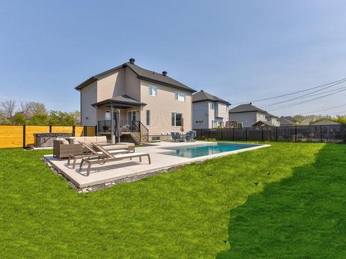 Exterior - 3124 Rue Édouard-Harbec, Carignan, QC - Outdoor With In Ground Pool With Backyard With Exterior