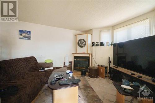 532 Mario Street, Hawkesbury, ON - Indoor Photo Showing Living Room With Fireplace
